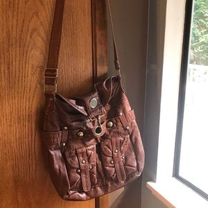Brown leather crossbody purse.
